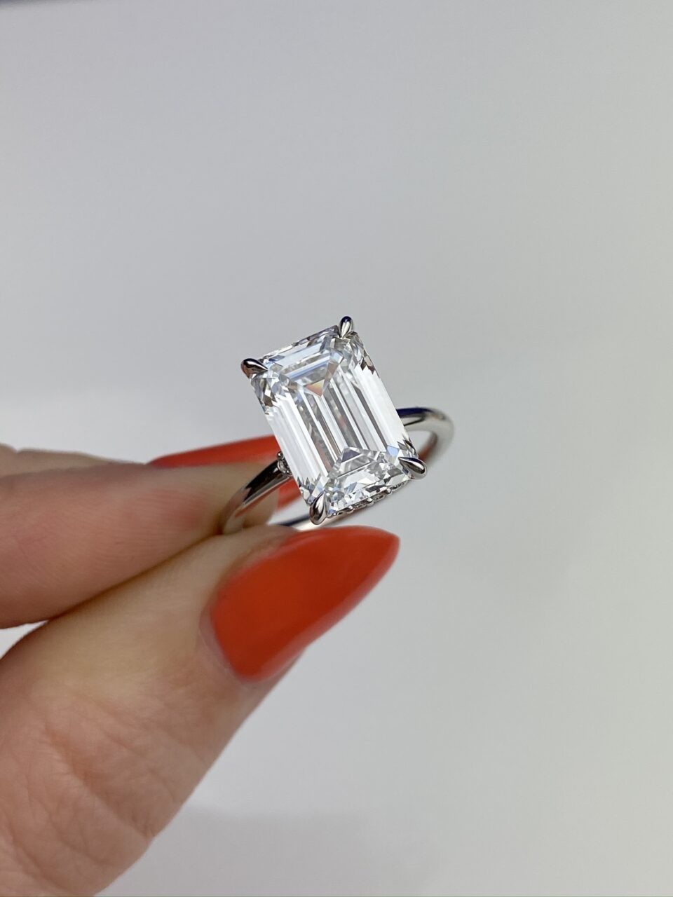 Frank Darling 5 carat emerald cut solitaire.