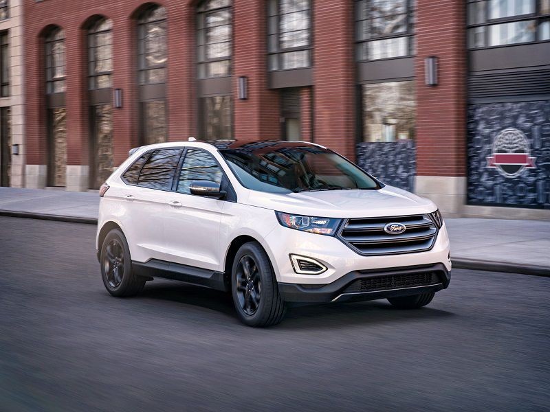 2018 Ford Edge White Driving Front Quarter ・ Photo by Ford