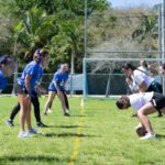 Miami Palmetto Powderpuff Game 2022: Team Ur Mom in blue jerseys.