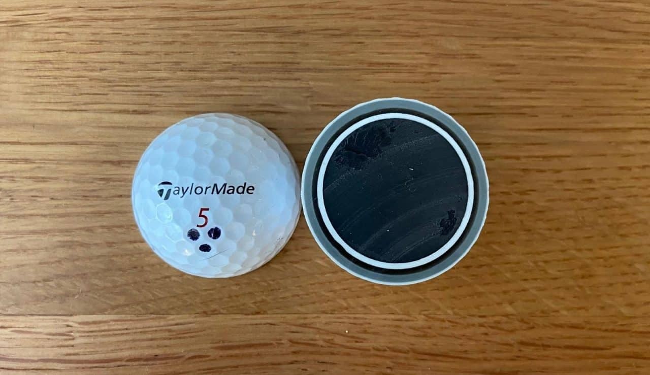 Taylormade TP5 golf balls on tee