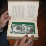 Secret book safe for money.