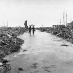 Devastation in Hiroshima after the atomic bomb explosion during World War II, showcasing the immense destructive power of nuclear weapons compared to hydrogen bombs.