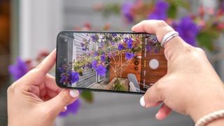 Apple iPhone 16 Plus Review showcasing camera in use