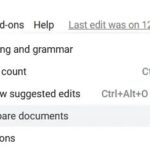 Accessing the compare tool in Google Docs through the Tools menu.