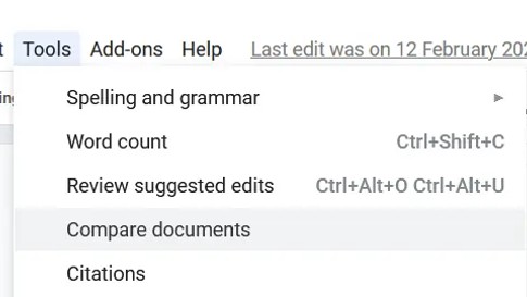 Accessing the compare tool in Google Docs through the Tools menu.