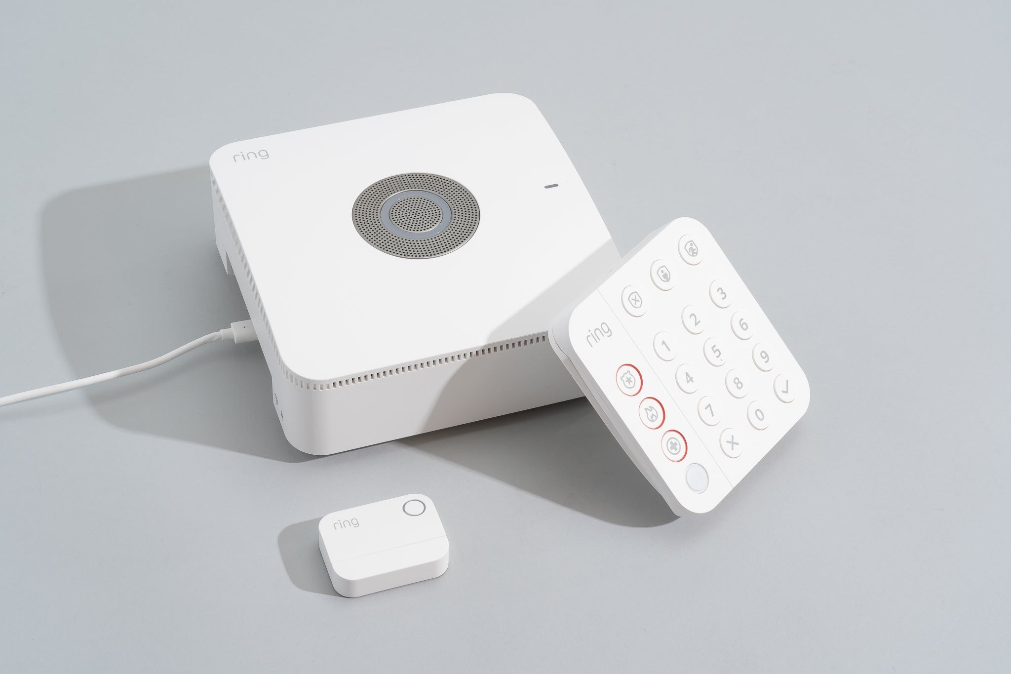 The base station, sensor, and keypad of the Ring Alarm system, a top pick for home security.