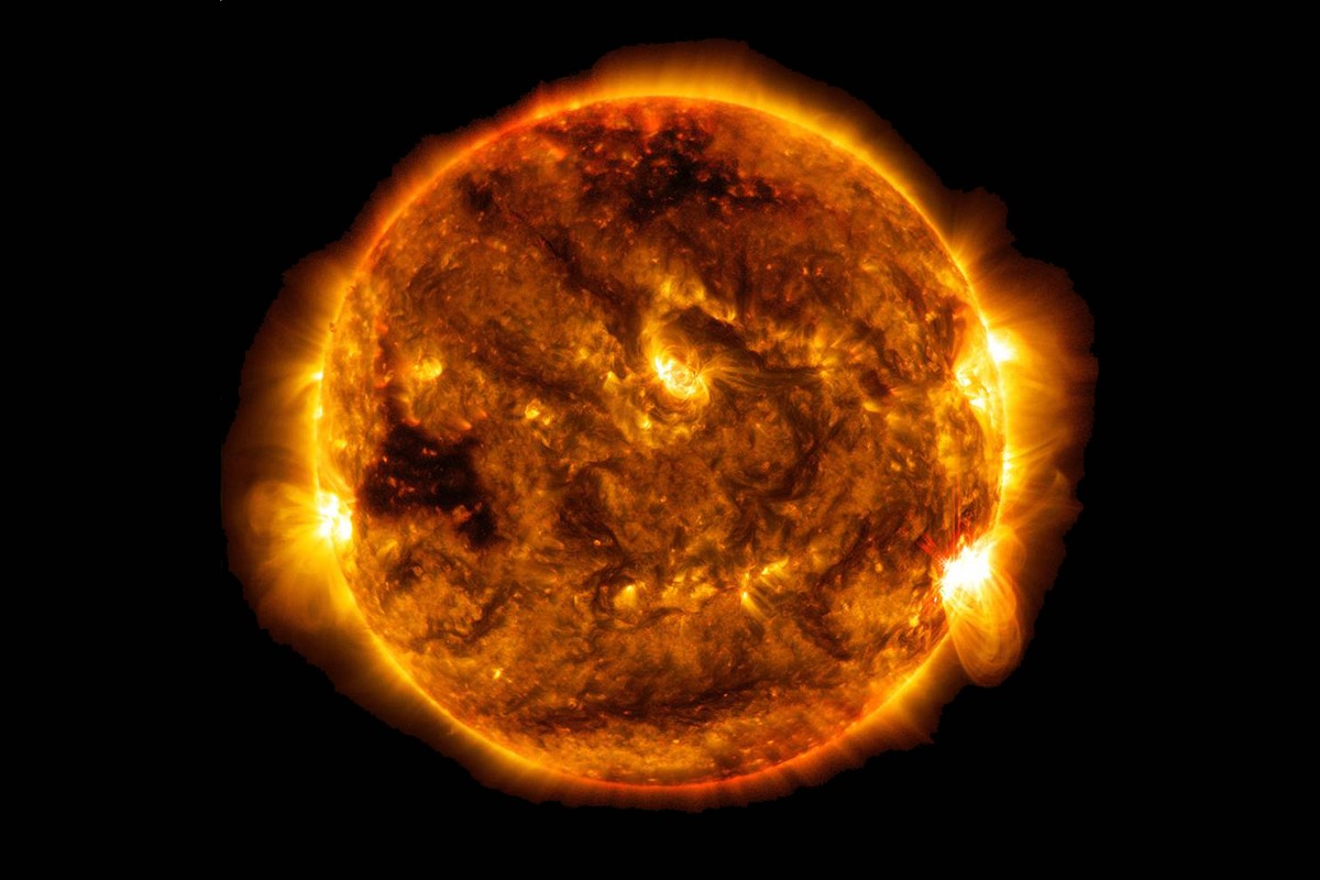 Detailed image of the Sun's surface captured by NASA's Solar Dynamics Observatory, illustrating the immense scale when considering how big is the Earth compared to the Sun.