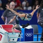 Maggie Mac Neil dives into the pool