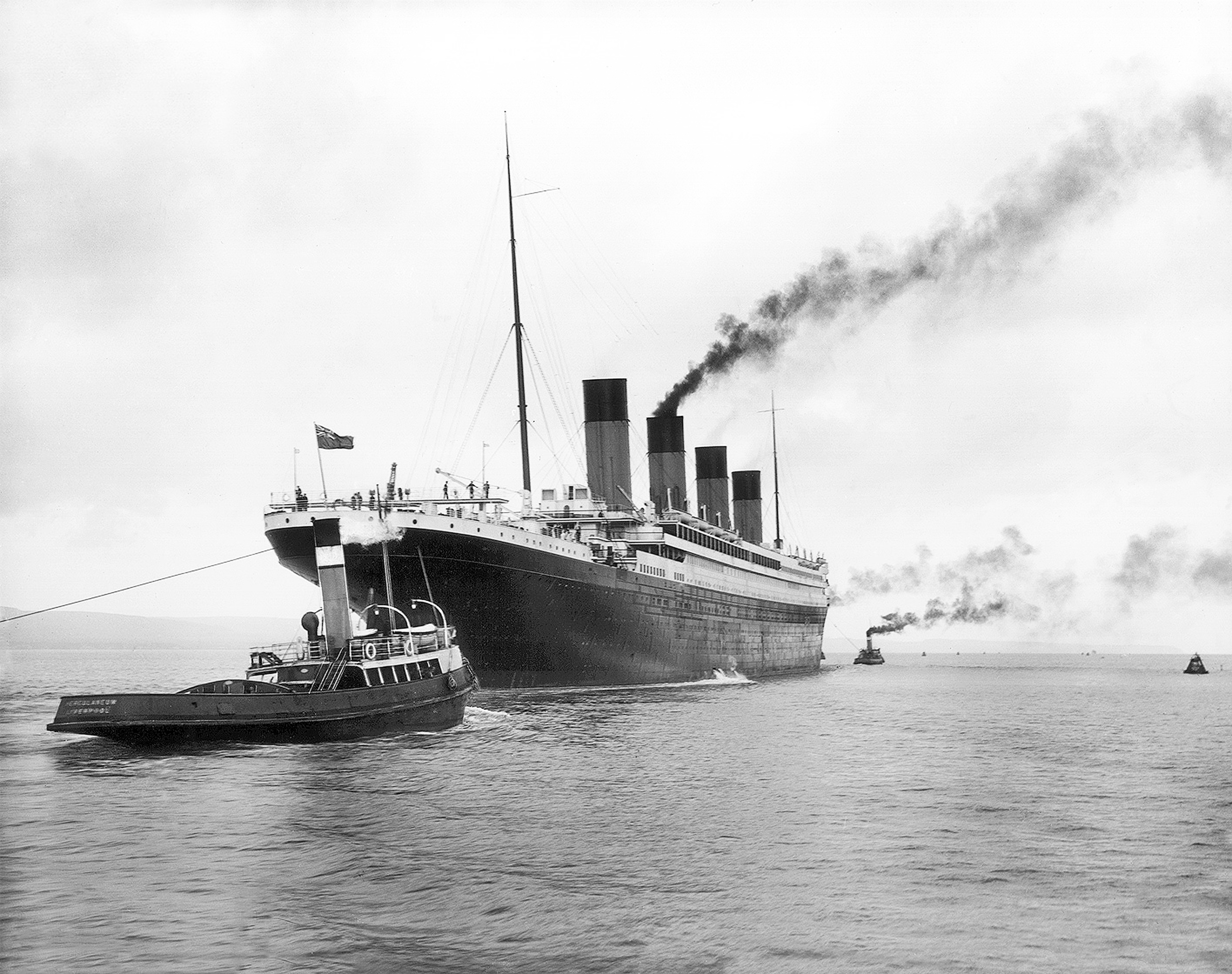 The Titanic, the largest passenger liner of its time, sailing on the ocean.