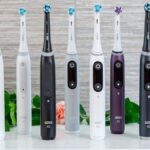 All Oral-B iO Series toothbrushes lined up showcasing the range from iO3 to iO10