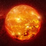 A graphic illustration of a large star glowing orange against a backdrop of smaller stars to visualize the size of the biggest star compared to the sun.