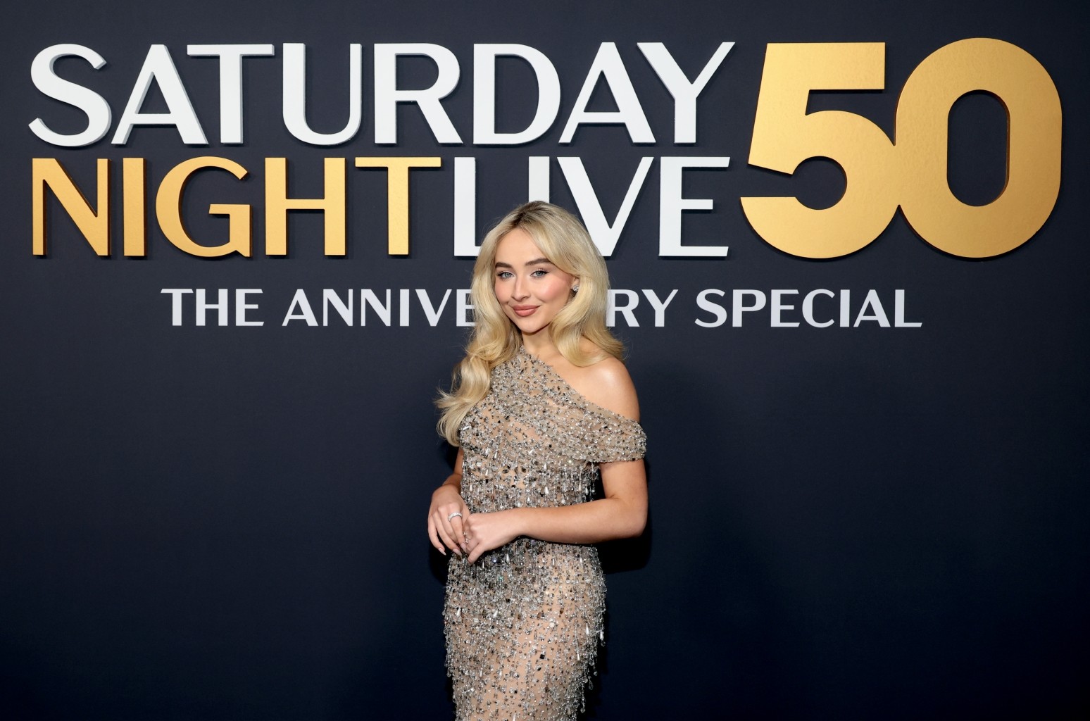 Sabrina Carpenter SNL50 Performance: Singer Sabrina Carpenter performing at the SNL50 anniversary show, part of the broader music performances during the event.