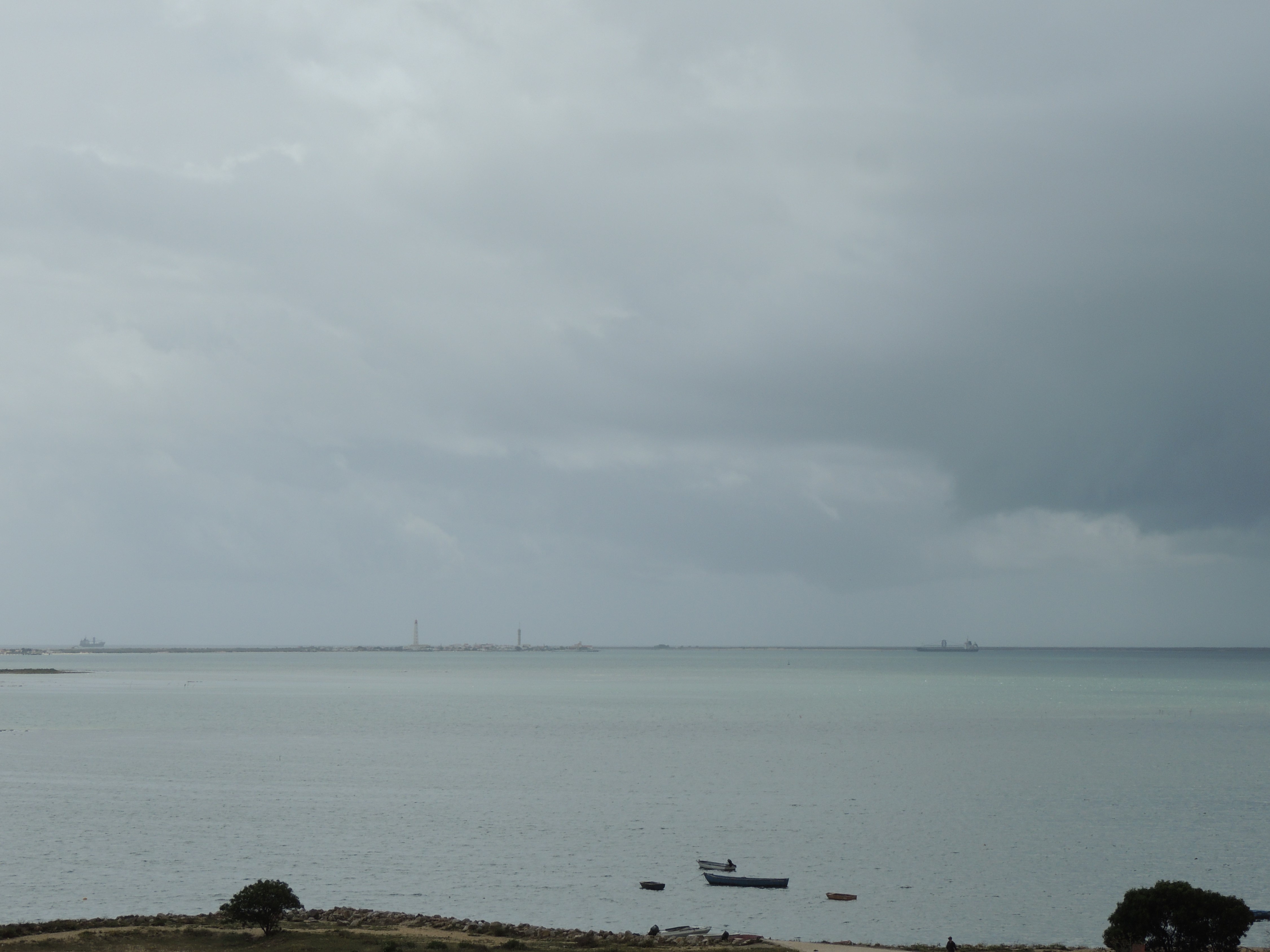 Ships sailing in calm waters, illustrating the historical context of the Horse Latitudes