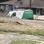 Swannanoa home damage showing the extensive destruction along U.S. 70 after Hurricane Helene's flooding.