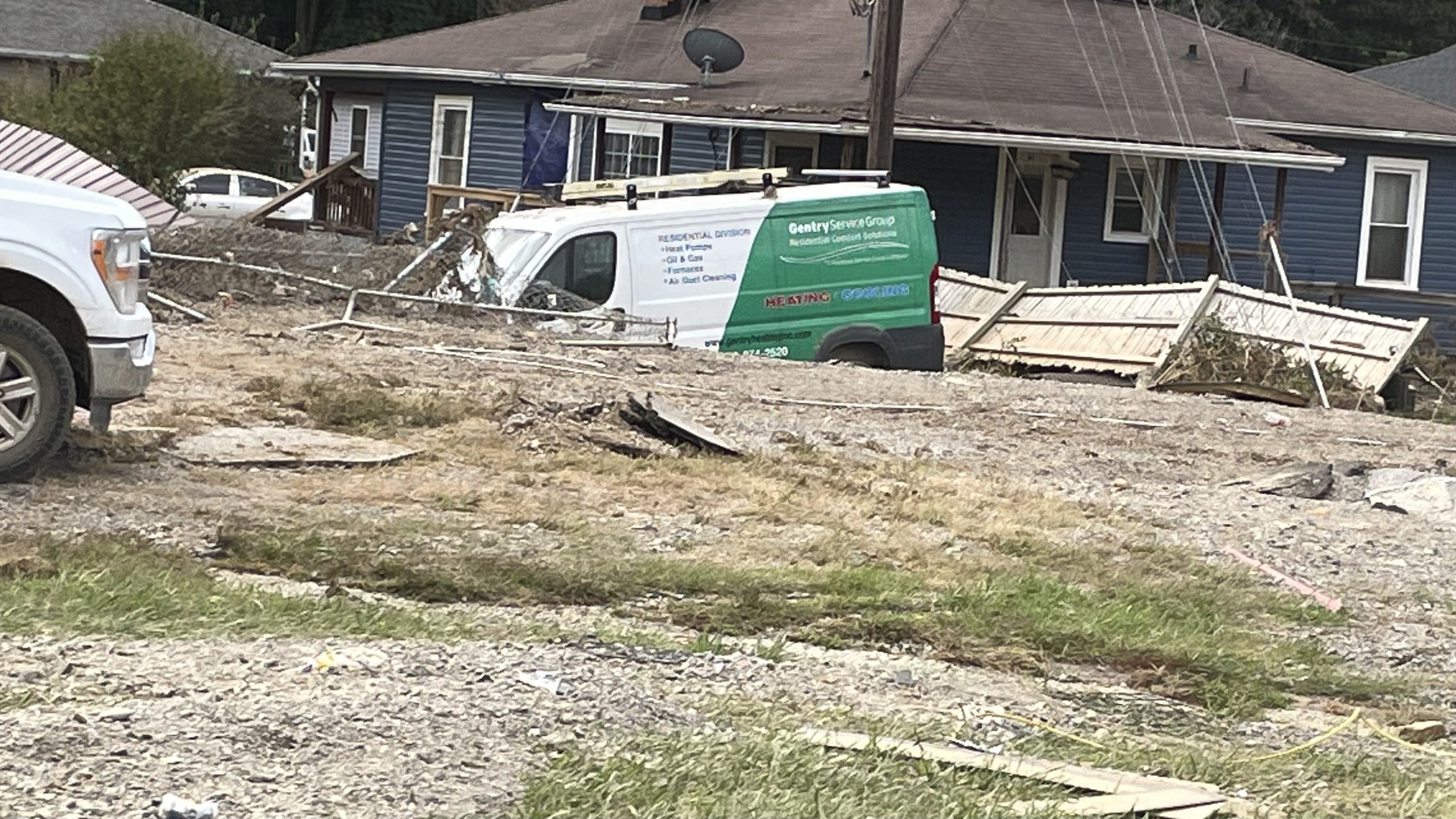 Swannanoa home damage showing the extensive destruction along U.S. 70 after Hurricane Helene's flooding.