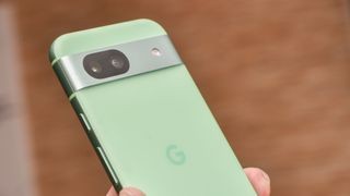 Google Pixel 8a in aloe green showing cameras