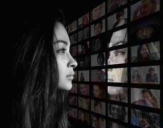 Woman looking at reflection in water, symbolizing the need to stop comparing yourself to others.