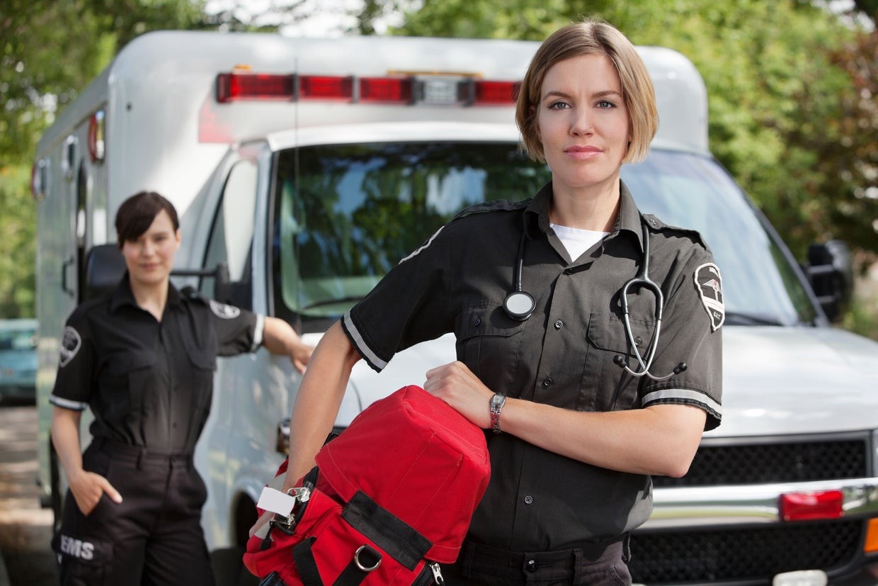 Emergency medical technicians tending to a patient