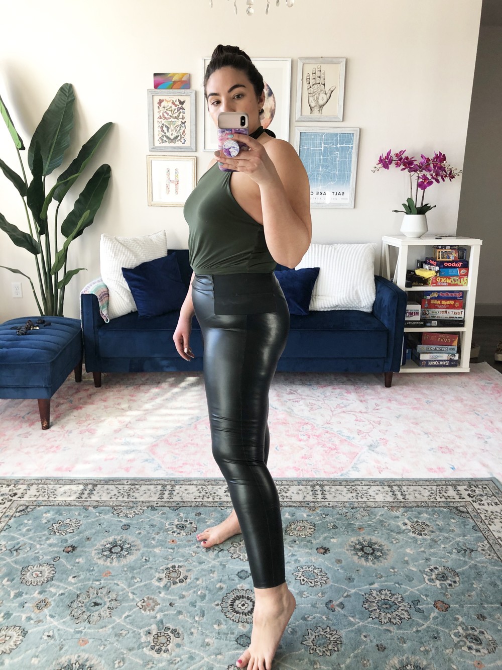 Woman in athleisure leggings and a sports bra, ready for a workout