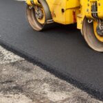 Asphalt driveway being paved