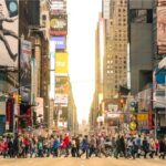 People walking around Times Square NYC