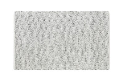 Neutral colored Burrow Cape House Rug featuring a subtle heathered chevron pattern, ideal for adding a cozy touch to a modern living space.