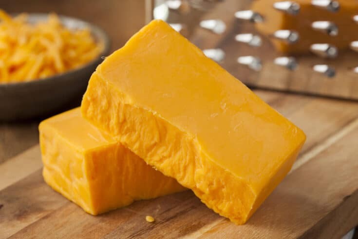 Cheddar Cheese block, a versatile cheese substitute with sharp flavor