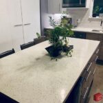 Concrete countertops vs granite, illustrating their unique textures and color variations