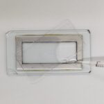 Filling a Sedgwick-Rafter cell with a pipette, showing the diagonal placement of the coverslip to avoid air bubbles