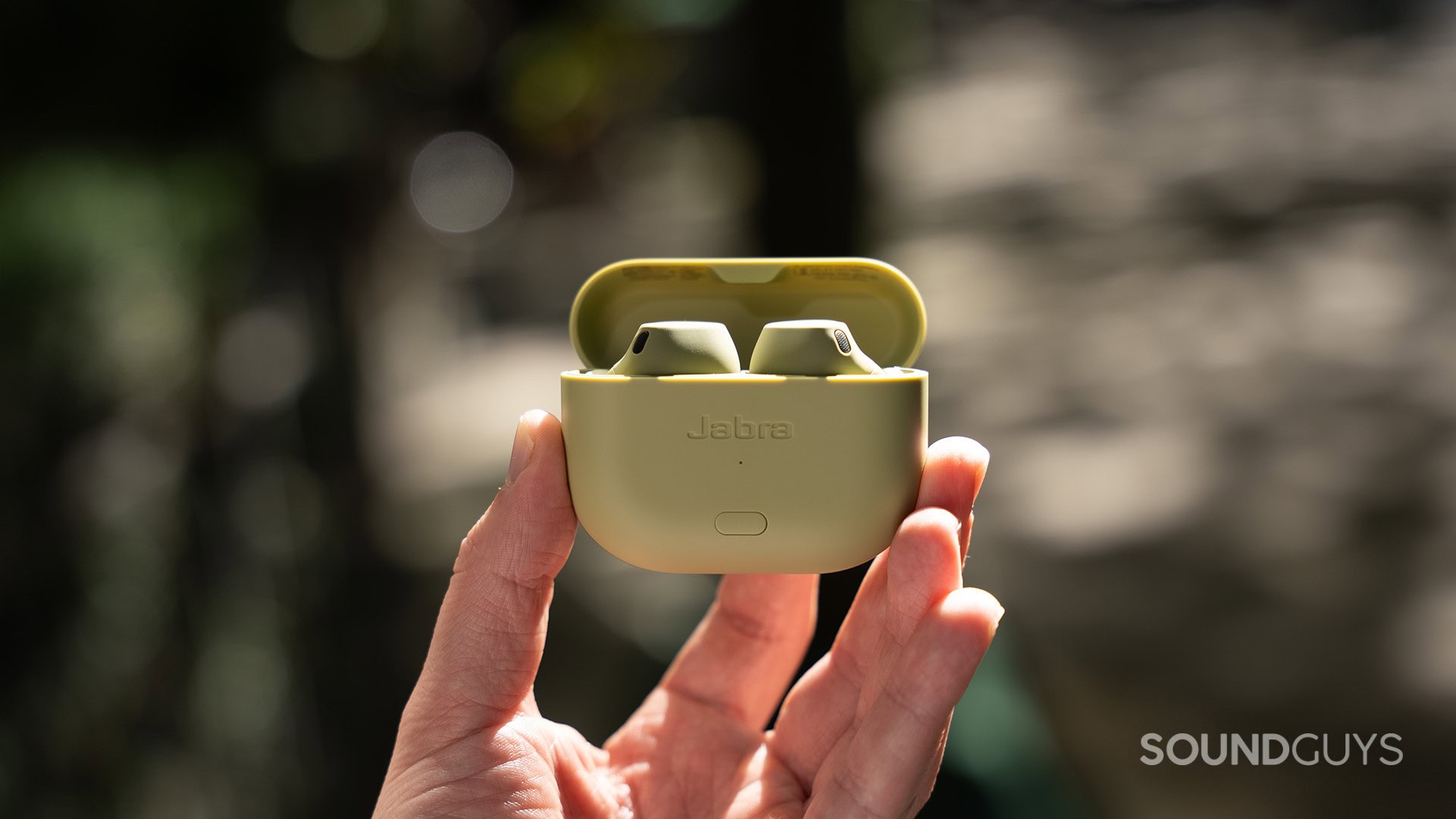 Jabra Elite 8 Active Gen 2 Held Outdoors Showcasing Portability