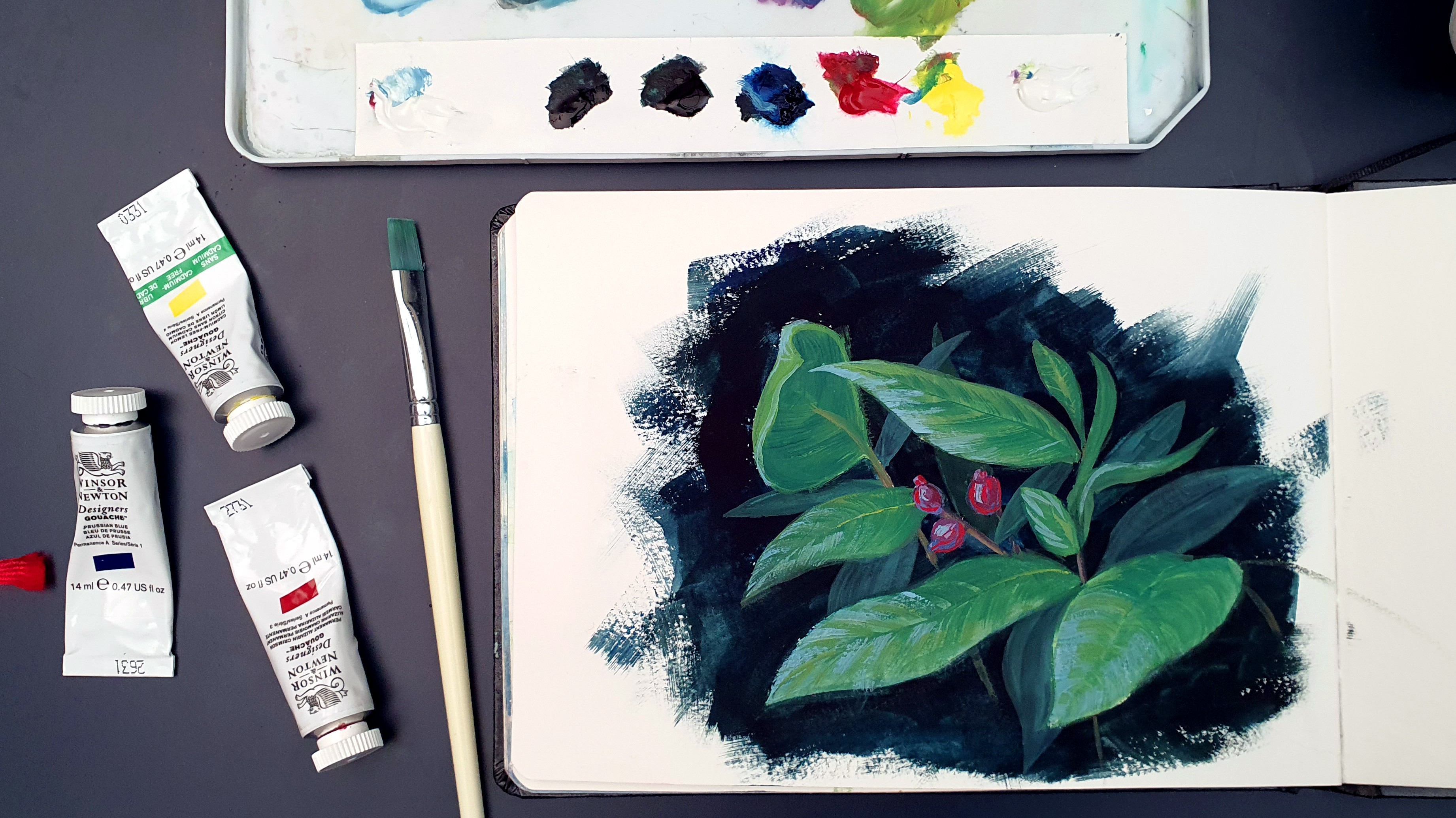 Gouache painting light colors on top of dark colors