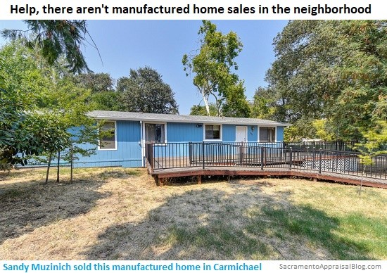 Rambler Style Home With Driveway and Garage