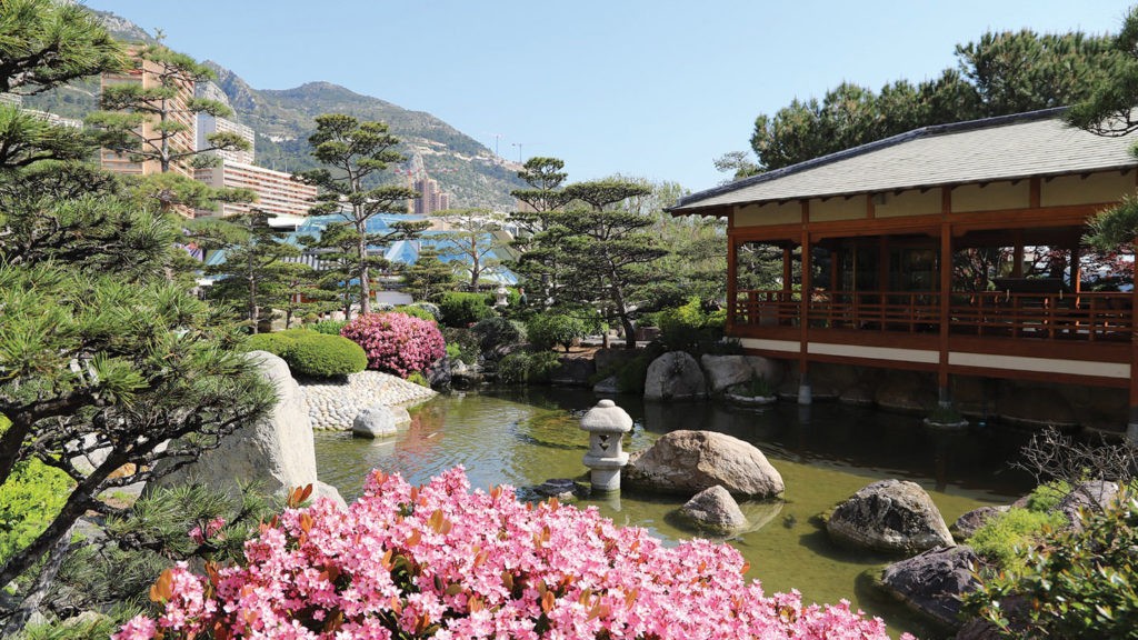 Monaco gardens with flowers and sculptures