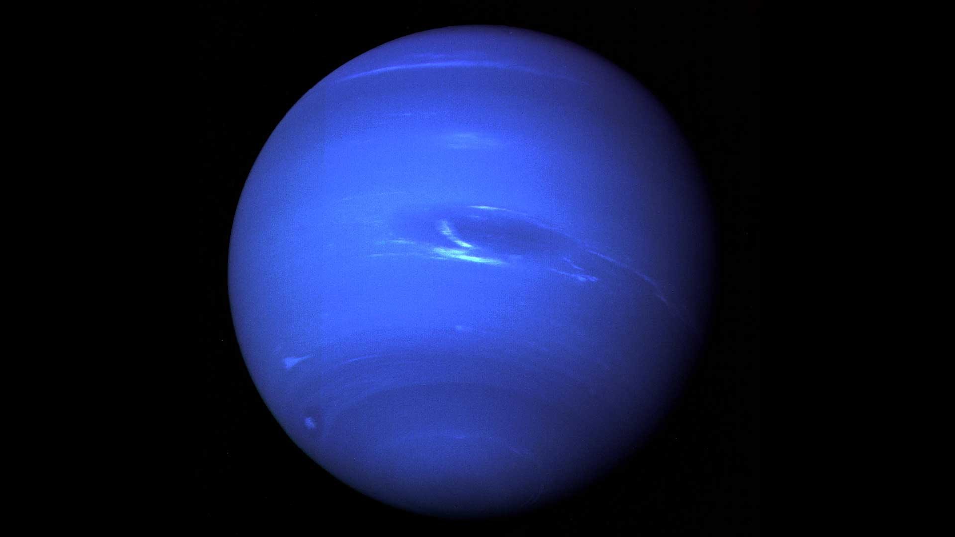 A comparative visualization showing the relative sizes of Earth and Neptune