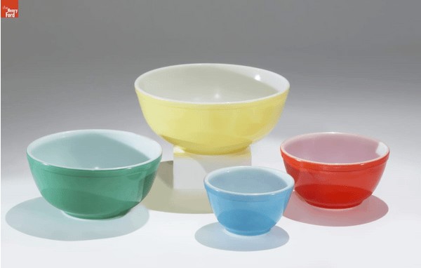 Colorful Pyrex mixing bowls, showcasing their vibrant designs and practical use in the kitchen