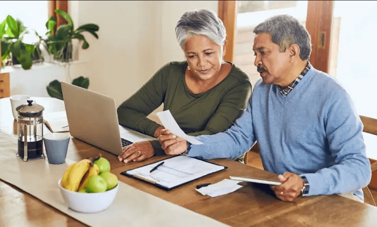 Couple reviewing annuity options for retirement planning