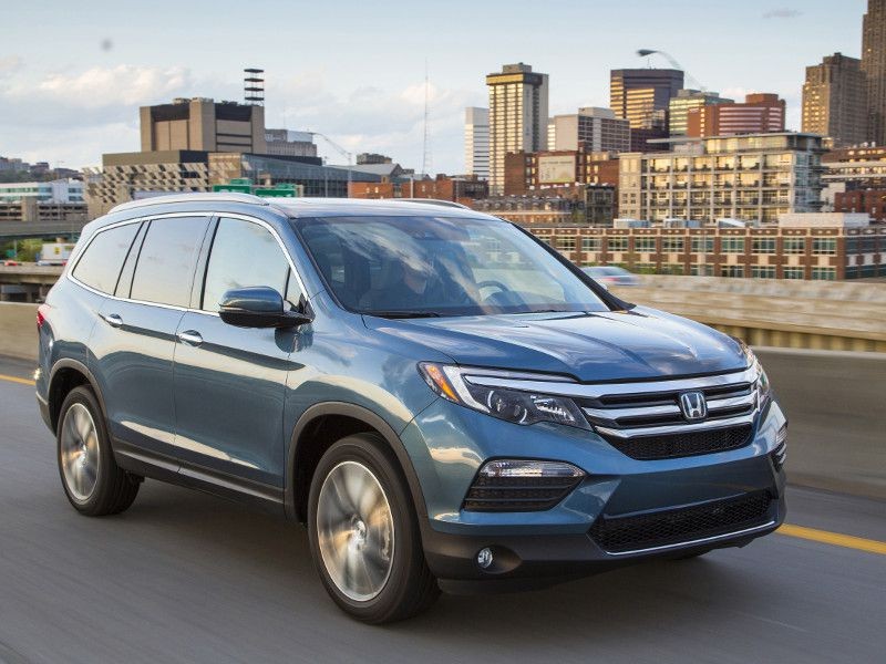 Honda Pilot on a Suburban Street - Photo by Honda
