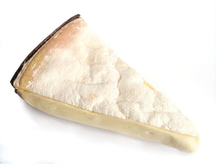 Vacherin Cheese wedge, a mountain cheese substitute perfect for melting