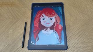 XPPen Magic Drawing Pad featuring a doodle of a female character, highlighting its drawing capabilities