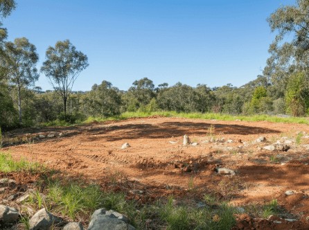 how big is 100 acres in football fields